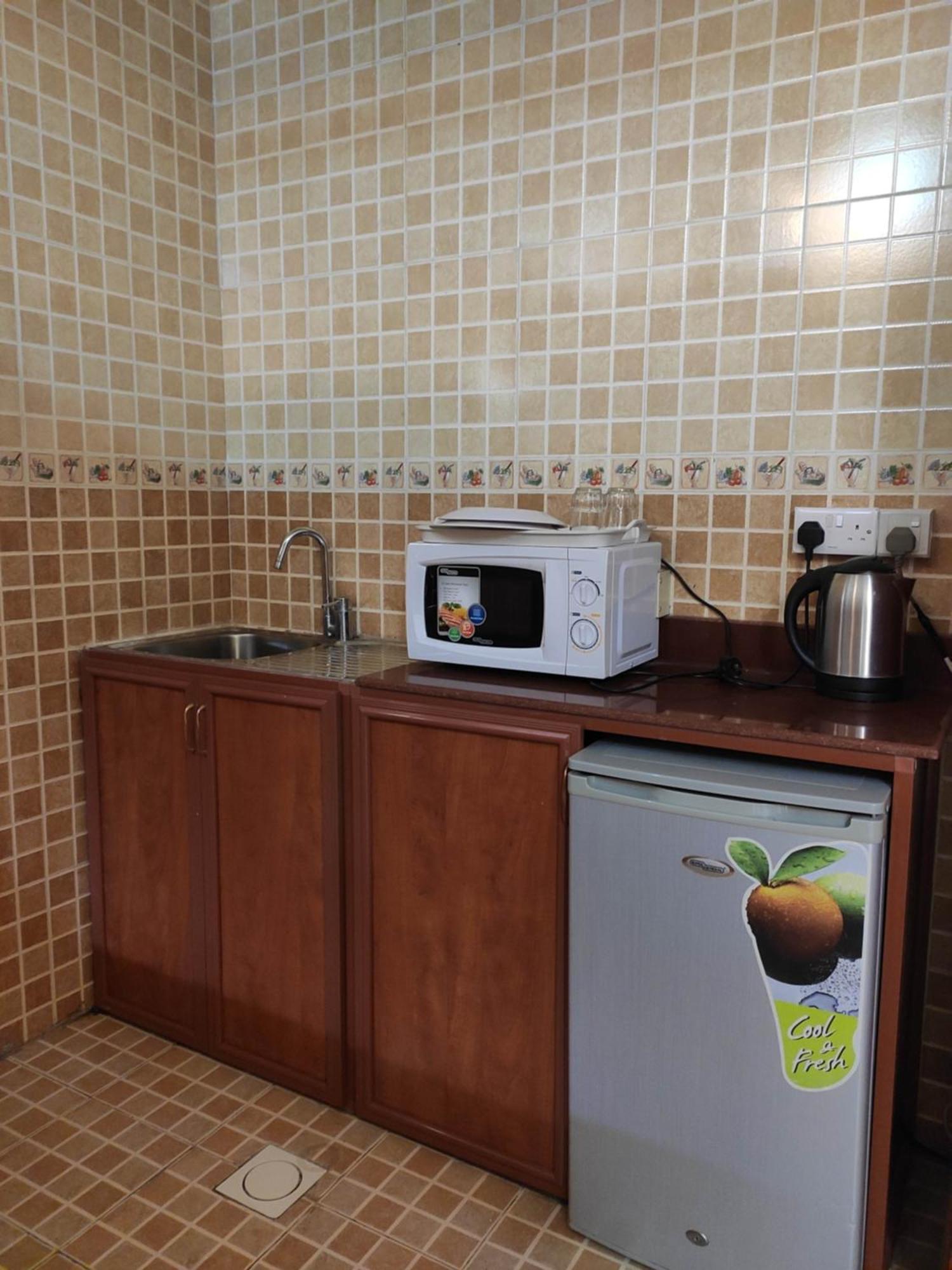 Al Nakheel Hotel Apartments Рас ал Хайм Екстериор снимка